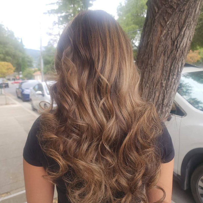 Long caramel balayage with soft waves