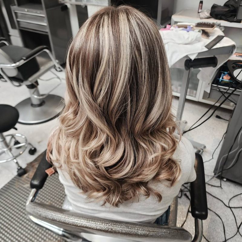 Chunky blonde highlights on brunette hair